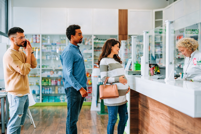 people in line at pharmacy