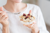 woman eating meal high in fiber